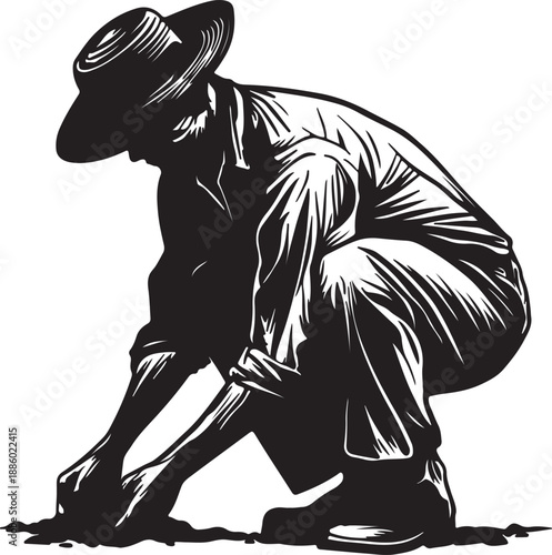 Black and white of a person carrying a large sack