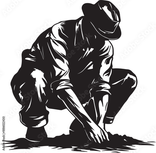 Black and white of a person digging with a shovel