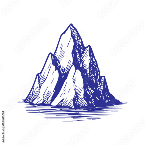 Iceberg tip floating in cold arctic water