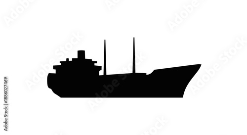 Silhouette of a Cargo Ship Sailing on the Open Sea.