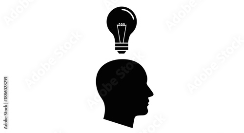 Silhouette of a human head with a glowing light bulb above it symbolizing an idea.