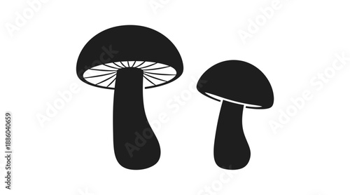 Simple illustration of two black mushrooms in a stark silhouette