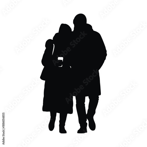 Silhouette of a man and woman standing together