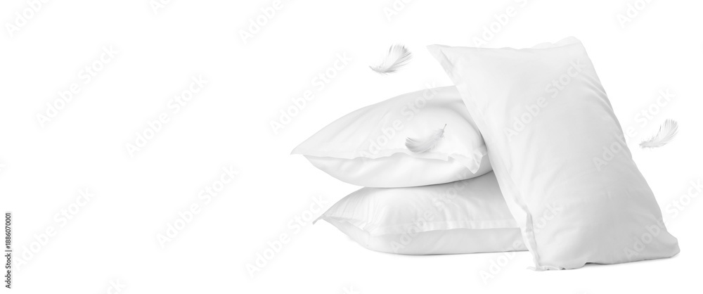 Naklejka premium Pillows and flying feathers on white background, poster design with space for text. Soft and comfort sleep