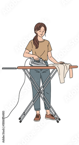 Young woman ironing shirt on board at home in casual clothing  
