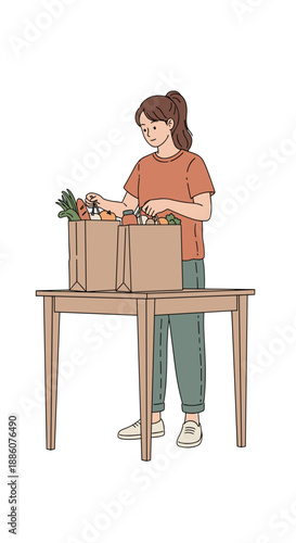 Woman unpacking groceries from bags on wooden table at home  