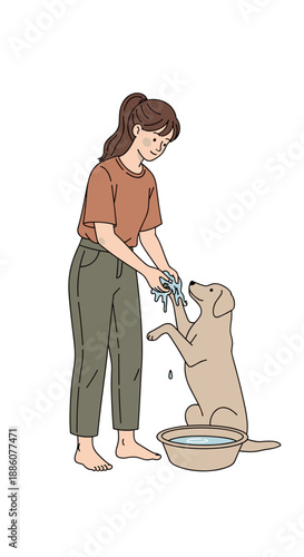 Woman washing her dog with water in a bowl at home  