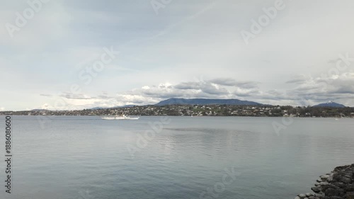 Wallpaper Mural White passenger boat sails across calm Lake Geneva waters Torontodigital.ca