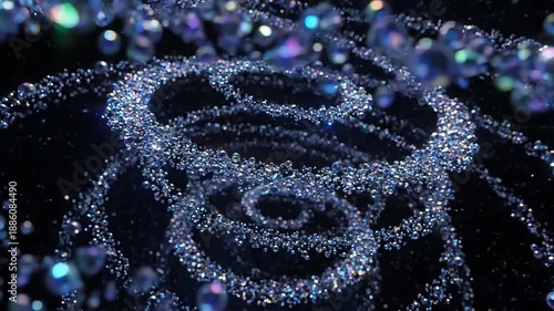 Sparkling abstract swirls of light and glitter on a dark background