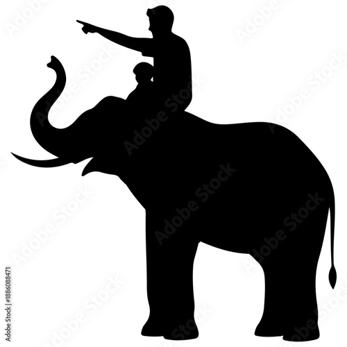 Silhouette of a man riding an elephant with his arm raised.