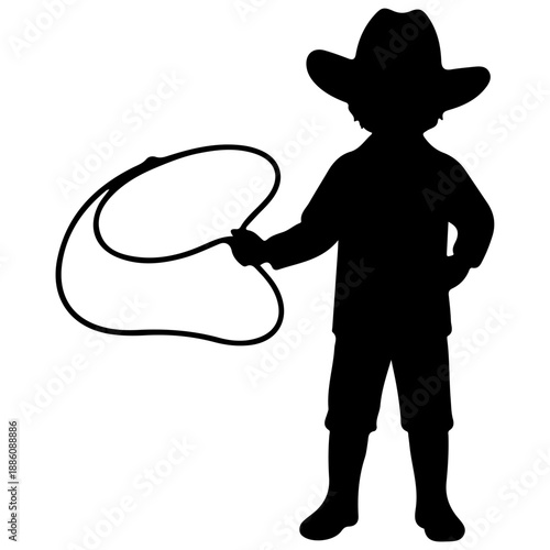 Silhouette of a child cowboy holding a lasso.
