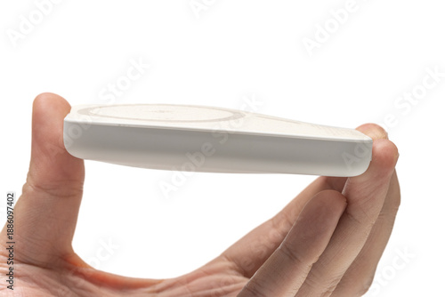 Quadro em tela hand holding swollen powerbank or battery pack