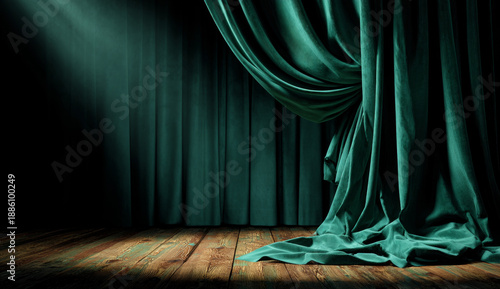 Elegant emerald green velvet curtain draped on a wooden stage with rich texture and flowing style, illuminated by soft stage lighting