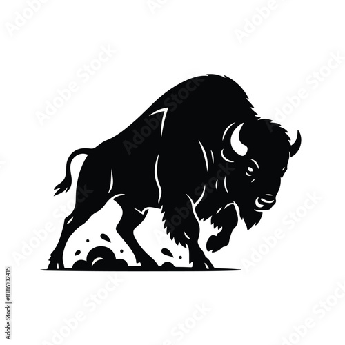 A striking black silhouette of a powerful bison depicted in a dynamic charge, kicking up dust, perfect for a strong brand or mascot.