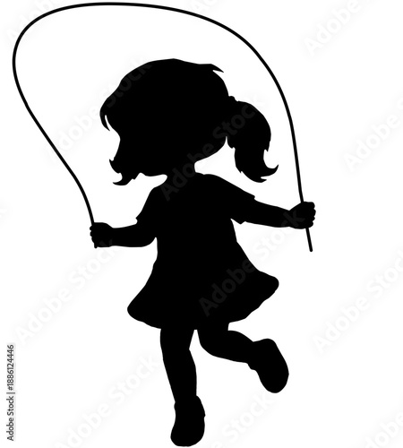 silhouette of a little girl playing jump rope