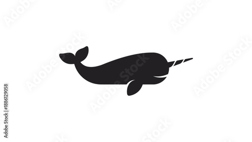 A majestic narwhal swimming in the Arctic waters, viewed from the side, showcasing its distinctive horn and sleek body
