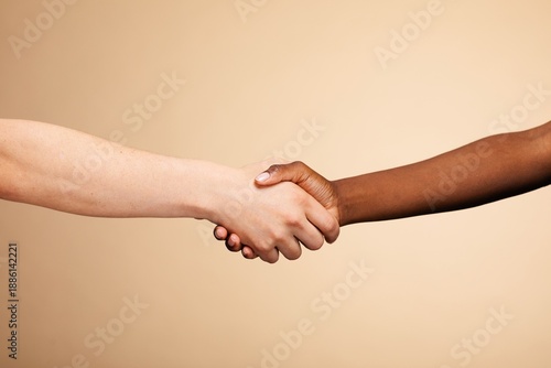 фотографія Handshake of diverse two people of different ethnicities