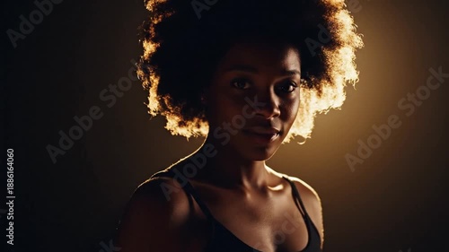 Strong African Woman Silhouette in Dramatic Lighting