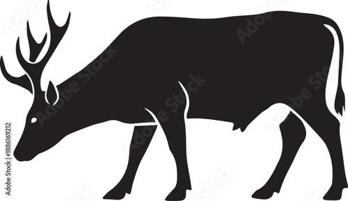 Black silhouette of a stag with antlers bending its head down deer buck