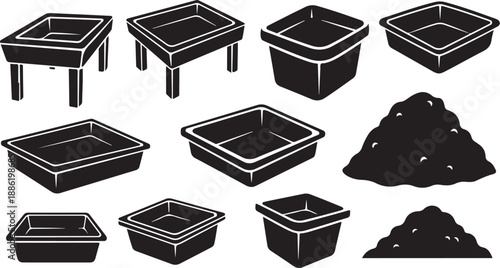 Collection of black planters and soil on white background