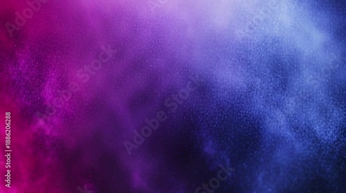 Vibrant pink and blue particle cloud forming a dynamic, energetic abstract background display