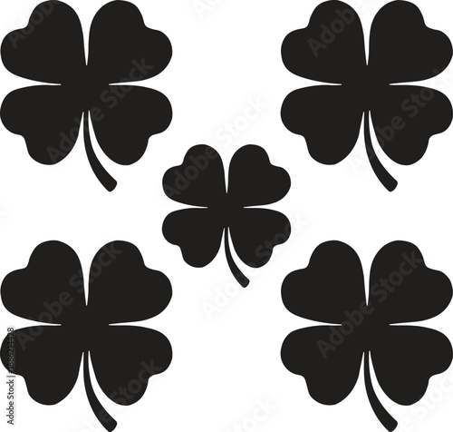 Five black four-leaf clovers arranged symmetrically on a white background, representing luck and St. Patrick's Day.