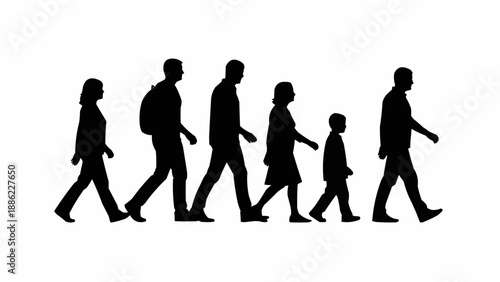Silhouettes of a diverse group of people walking together.