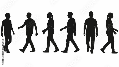 Silhouettes of people walking in a line.