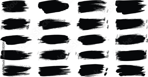 Collection of black brush strokes arranged in a grid pattern on a clean background