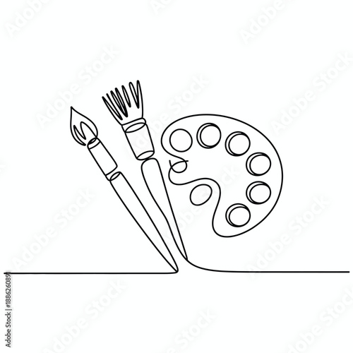 Paintbrushes and palette for artistic creations