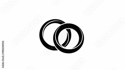 Two interlocking wedding rings symbol of love and commitment.