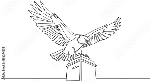 eagle spreading wings on pedestal