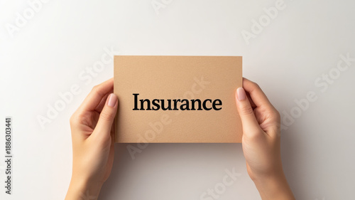 Wallpaper Mural Hands holding paper insurance concept, neutral background, safety and protection idea Torontodigital.ca