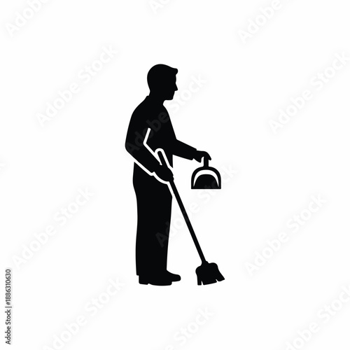 A janitor holding a dustpan while standing upright with a broom