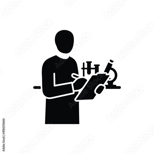 Scientist examining specimen on microscope slide in laboratory setting