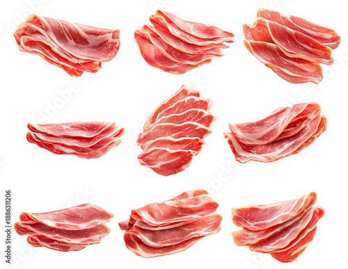 Jamon Iberico cured ham slices with marbled texture, isolated on white transparent background. Concept of cured meats.