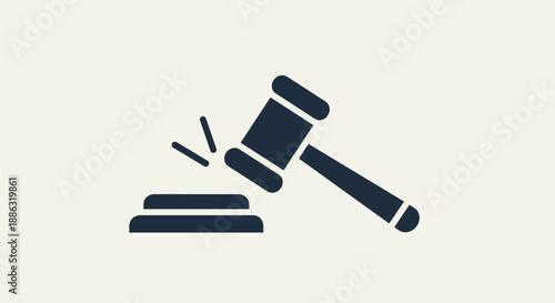 Gavel striking a sound block representing legal judgment and justice