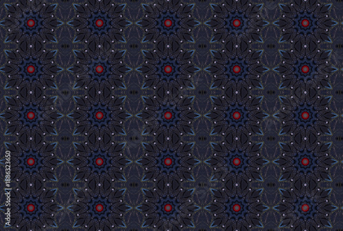 Black circular shapes with red dots in the middle repeating patterns