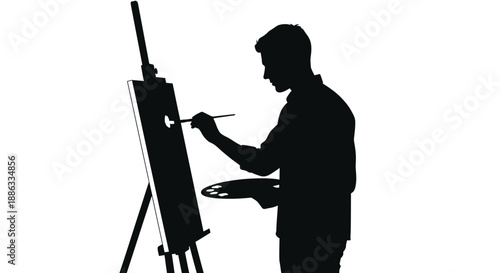 Silhouette of an artist painting at an easel with a palette