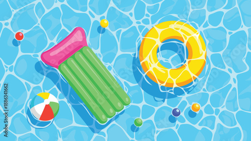 Overhead view of a blue swimming pool with a green air mattress, yellow ring, and colorful balls floating on the water.