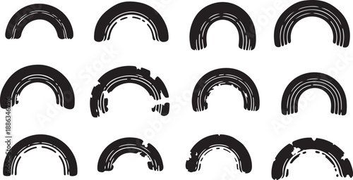 Collection of black rainbow shapes on white background