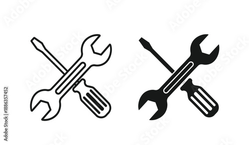 Black and white line icons of crossed screwdrivers and wrenches for repair and construction