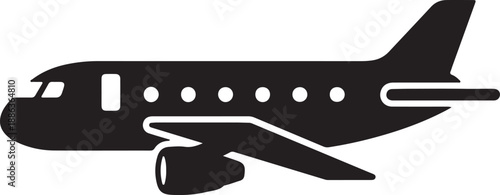 Black and white airplane with landing gear extended