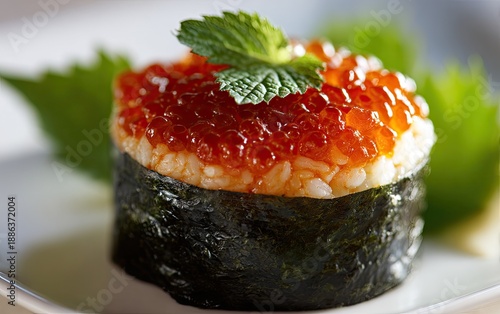 Wallpaper Mural Close up of sushi roll with red roe topping and fresh mint garnish Torontodigital.ca