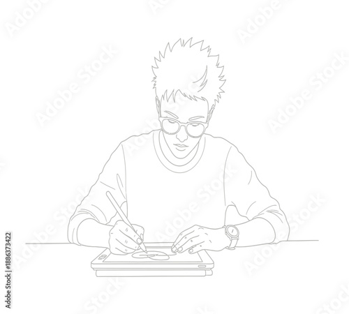 A focused young man with glasses diligently writing or drawing on a digital tablet
