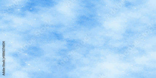 A beautiful clear blue sky background features white fluffy cumulus clouds on a bright sunny summer day with a natural light atmosphere