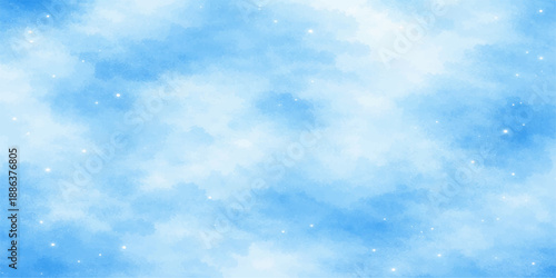 Beautiful abstract blue winter sky background featuring fluffy white clouds in a clear natural atmosphere with beautiful sunny light and soft cumulus cloudscape