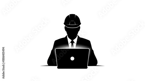 Silhouette of an engineer wearing a hard hat working on a laptop.
