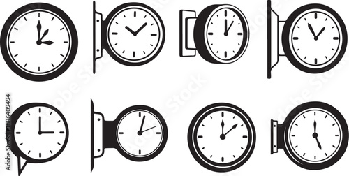Collection of various analog wall clocks in black and white
