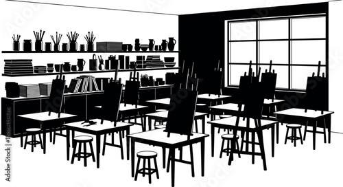 Art studio interior with easels, tables, chairs, and supplies